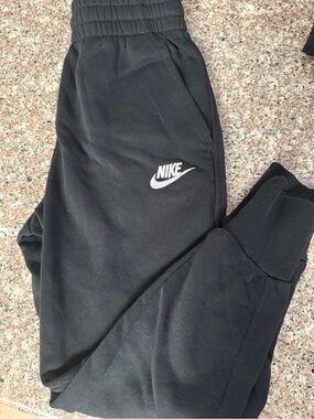 Nike Kids Black Sweatpants with White Swoosh
